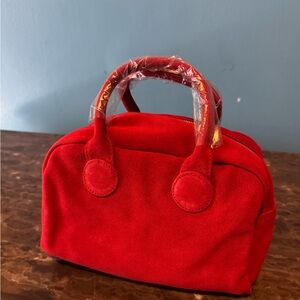 Marge Sherwood soft bowling bowl in Red Suede.